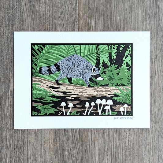An art print of a raccoon walking through the woods.