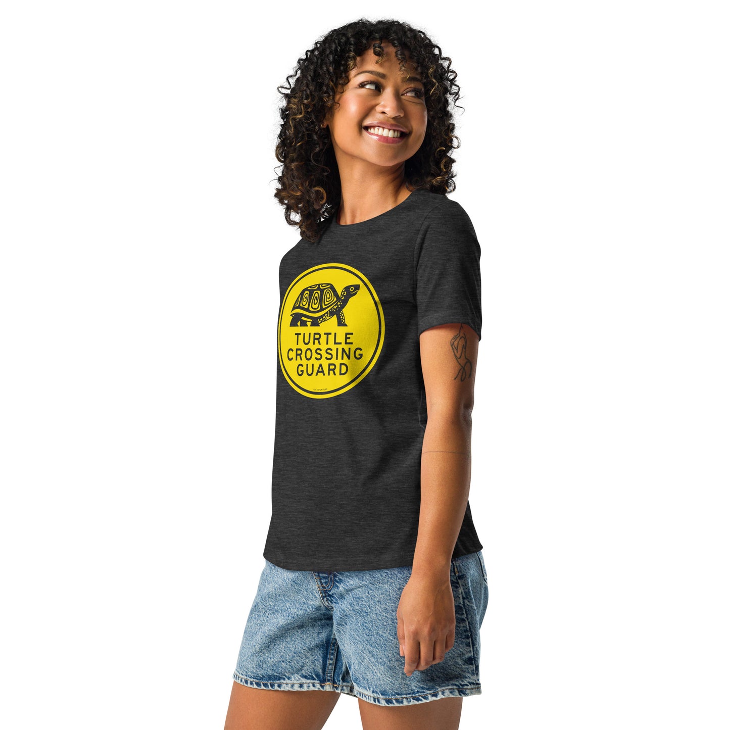 Model wearing short-sleeved turtle crossing guard t-shirt in heather grey.