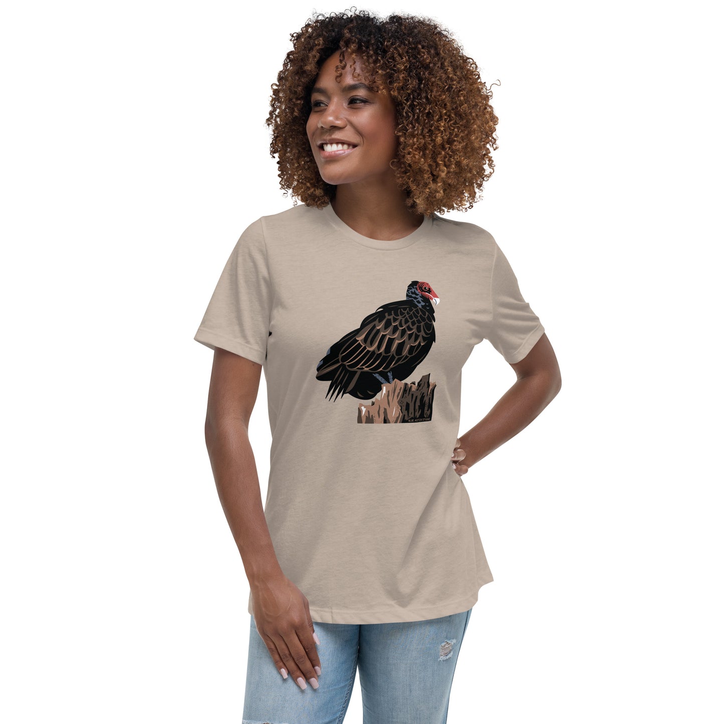 A model wearing the women's cut majestic turkey vulture t-shirt in stone.