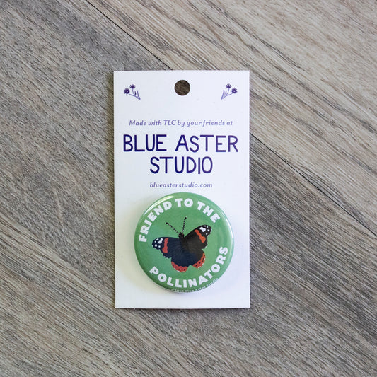 A 1.5 inch green pinback button with an illustration of a red admiral butterfly and the words Friend To The Pollinators.