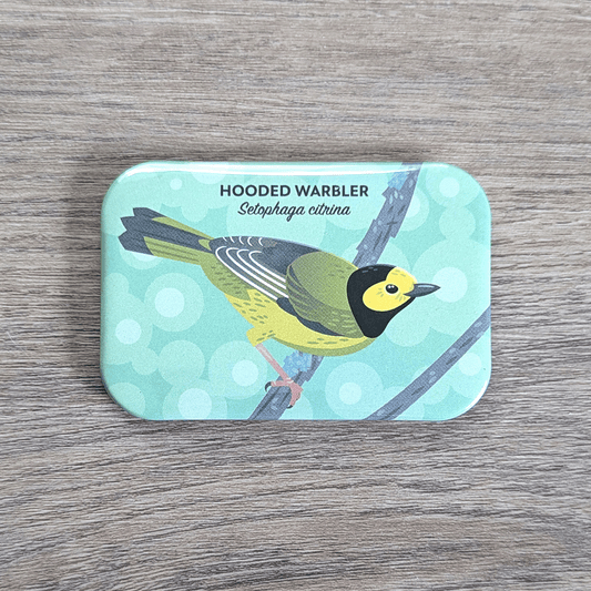 A rectangular magnet with rounded corners illustrated with a yellow, dull green, and gray bird with a yellow face and bold black hood marking around the face.