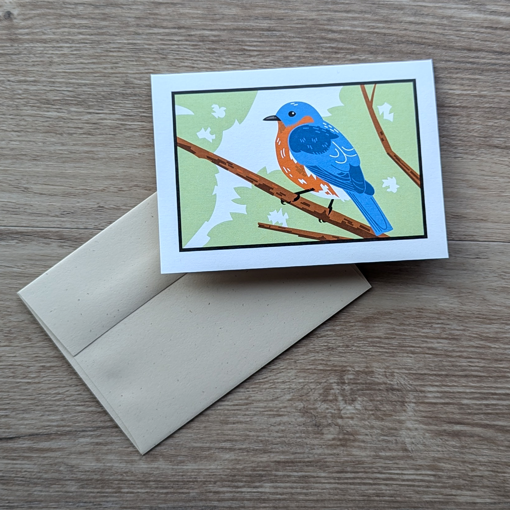 A bluebird card with envelope.