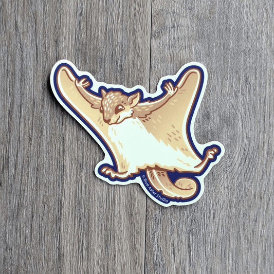 A sticker of a flying squirrel with arms and legs oustretched in a gliding posture.