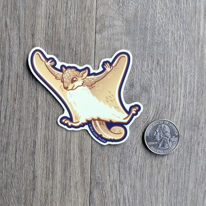 The flying squirrel sticker with a USD quarter beside it to show scale.