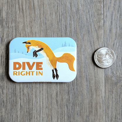 The fox magnet with a USD quarter to show scale. Measures 2 inches by three inches.