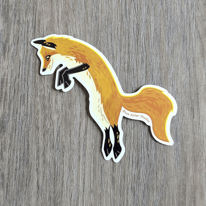 Sticker of an illustrated fox jumping.