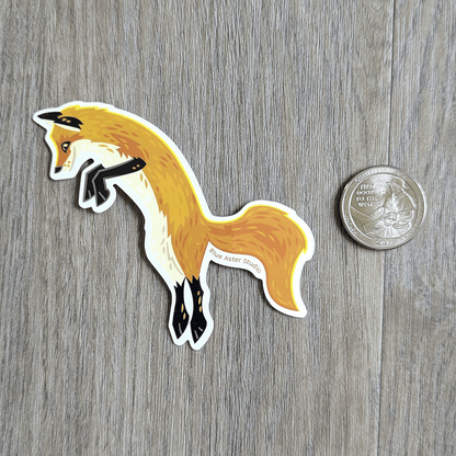 Fox sticker sitting next to a USD quarter for scale.
