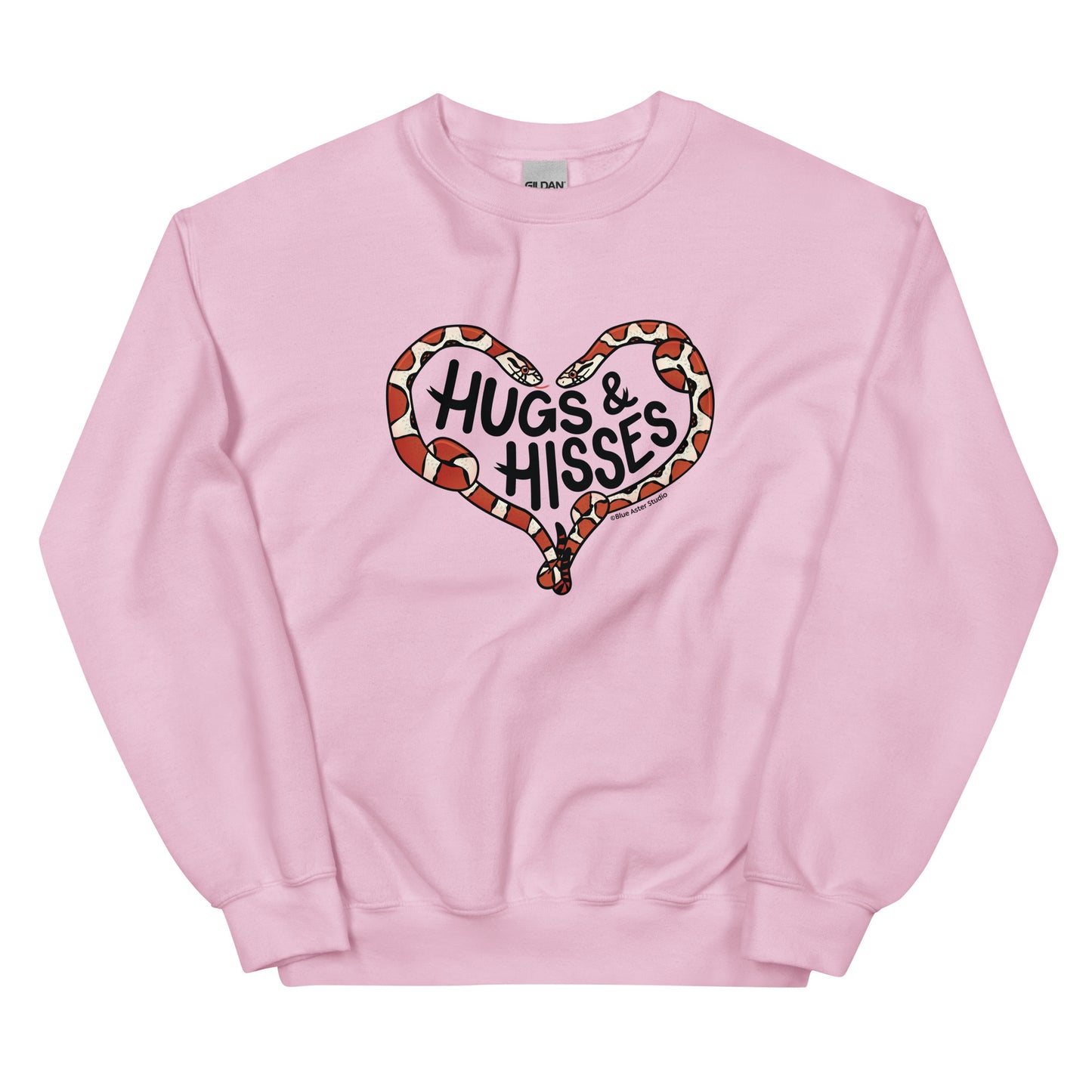 A pink sweatshirt with a pair of illustrated corn snakes forming a heart around the text "Hugs and Hisses"