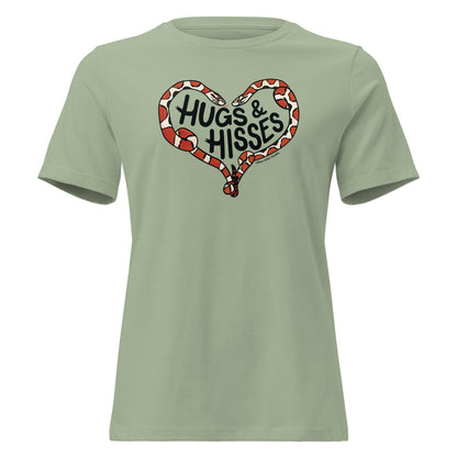 A sage green t-shirt with a pair of illustrated corn snakes forming a heart around the text "Hugs and Hisses"