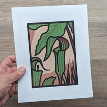 Load image into Gallery viewer, Screen printed illustration of two jack-in-the-pulpit flowers under their large leaves. The eight by ten inch print is held in hand to show scale.