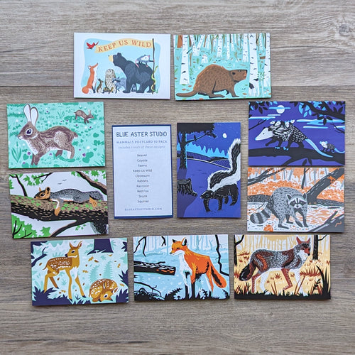 A set of 10 postcards featuring illustrated mammals including Beaver, Coyote, Fawns, Keep Us Wild, Opossums, Rabbits, Raccoon, Red Fox, Skunk, Squirrel