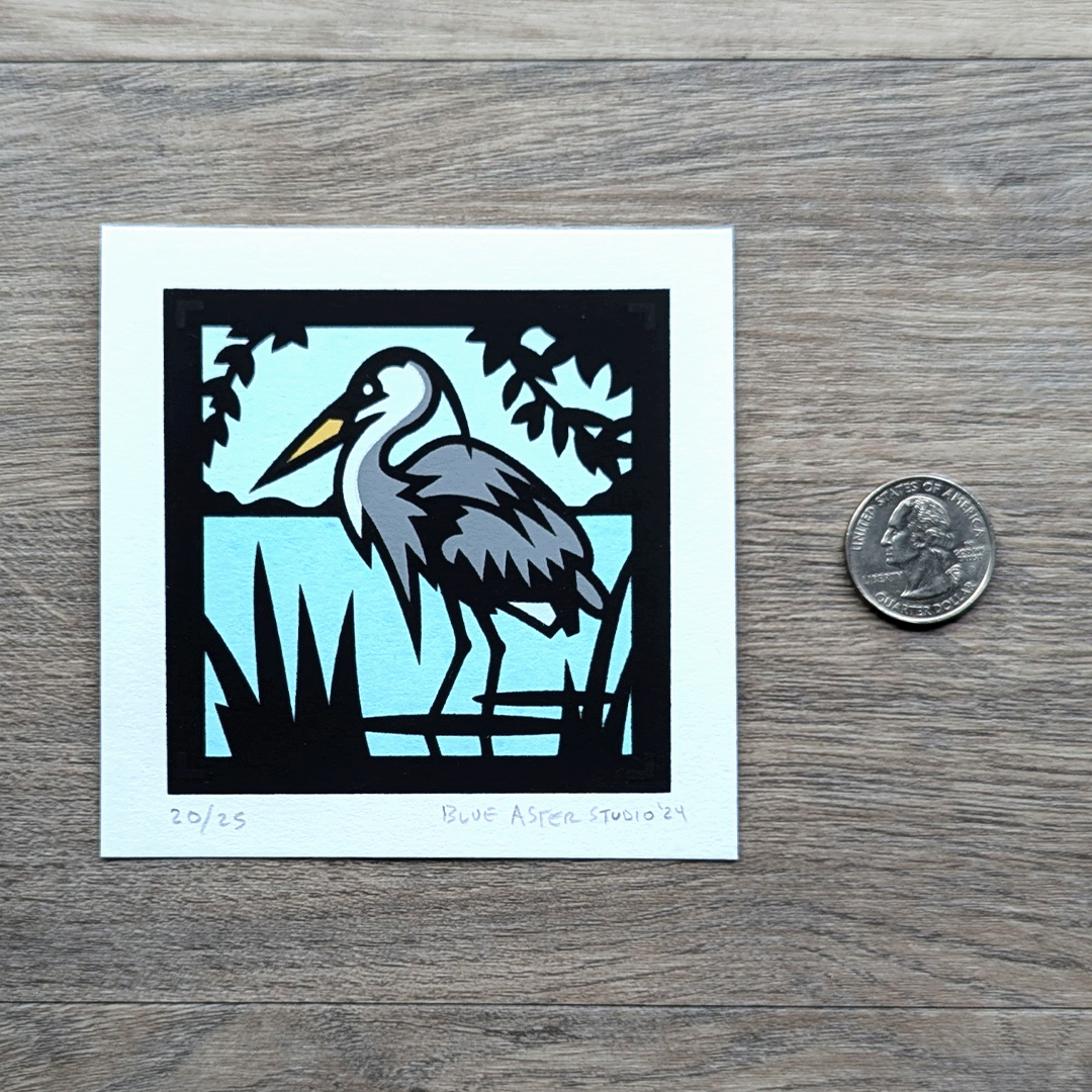 The great blue heron mini screen print with a USD quarter for scale