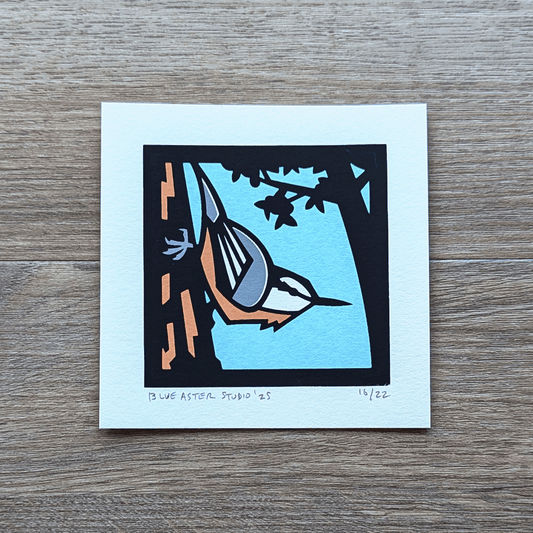 A mini screen print of a red-breasted nuthatch.
