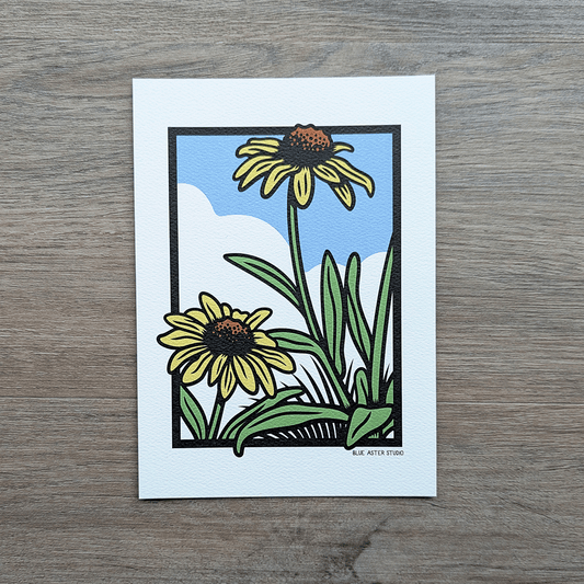 A printed illustration of yellow rudbeckia flowers