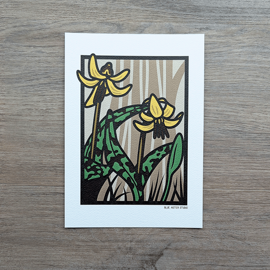 A small art print of yellow trout lilies in a woodland