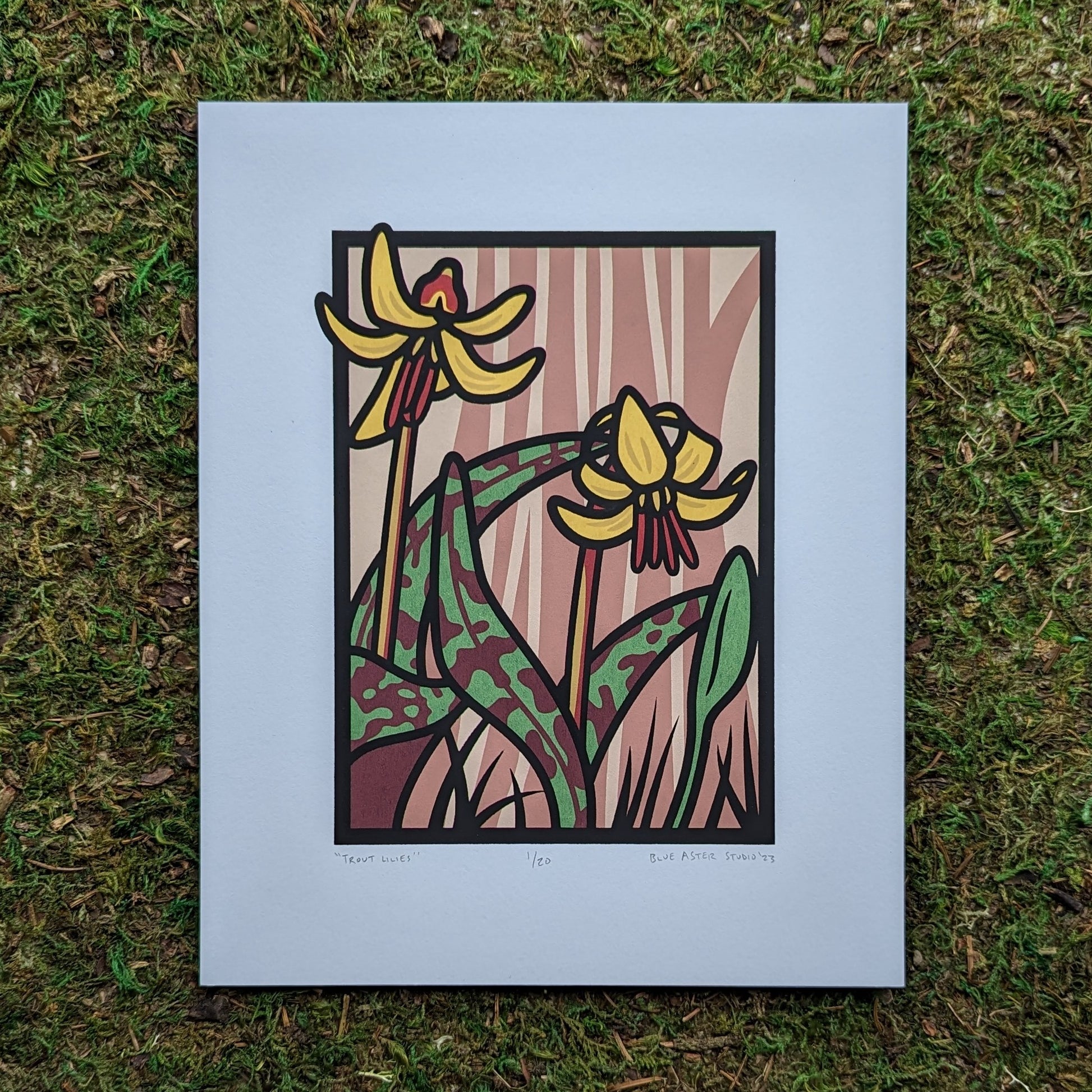 Screen printed illustration of two yellow trout lilies. Print sits on a green mossy background.