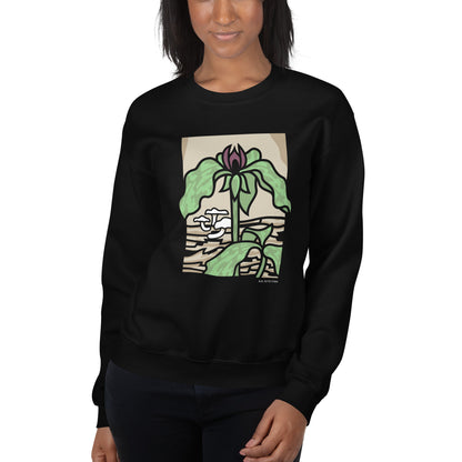 A woman modeling the unisex prairie trillium sweatshirt.