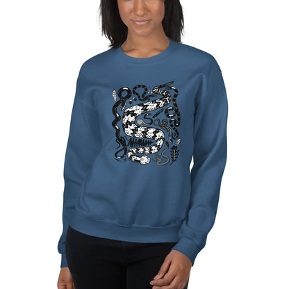 A woman modeling the indigo blue seven snakes sweatshirt.
