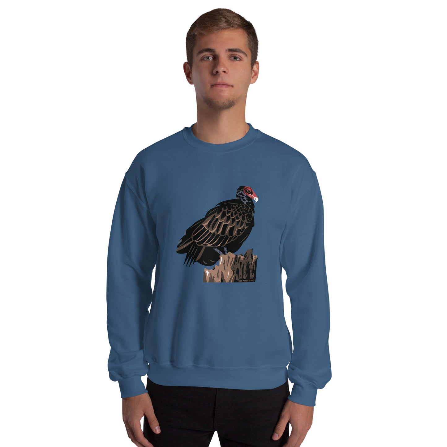 A man wearing the indigo blue majestic turkey vulture sweatshirt.