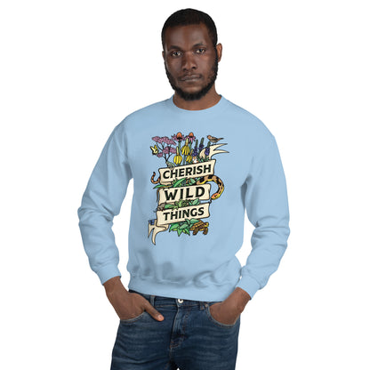 A model wearing a light blue Cherish Wild Things sweatshirt.