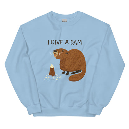 A light blue sweatshirt with an illustration of a beaver and the words I Give A Dam printed on the front.