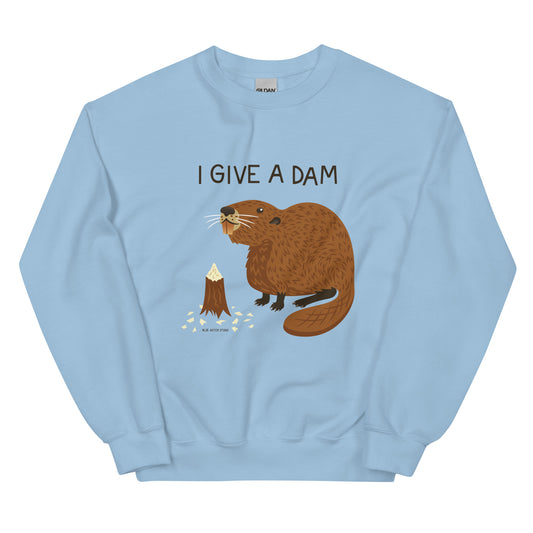 A light blue sweatshirt with an illustration of a beaver and the words I Give A Dam printed on the front.