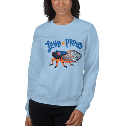 A woman modeling the cicada sweatshirt in light blue.
