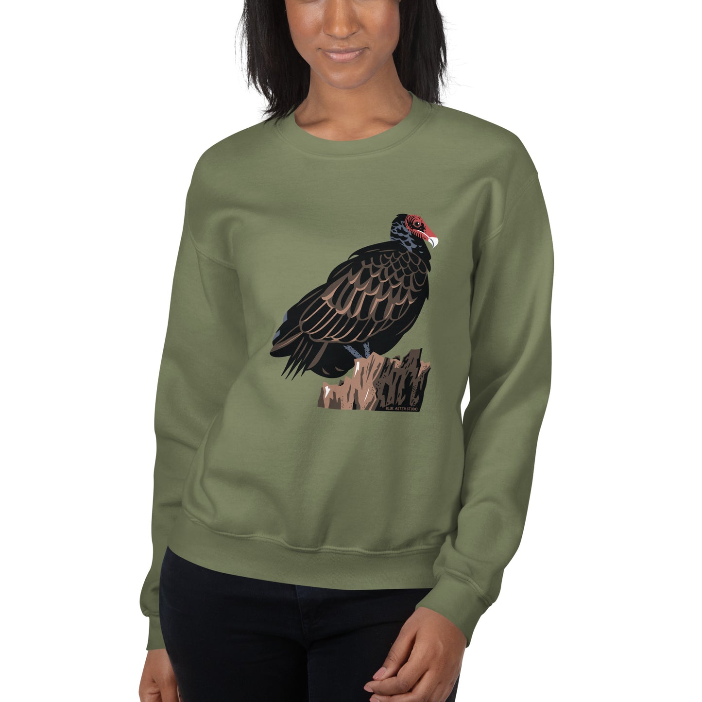 A woman modeling the military green colored majestic turkey vulture sweatshirt.