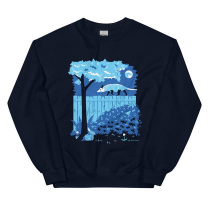 A navy blue sweatshirt with an illustration of an opossum walking on a moonlit fence with a rabbit and a luna moth in the yard below.