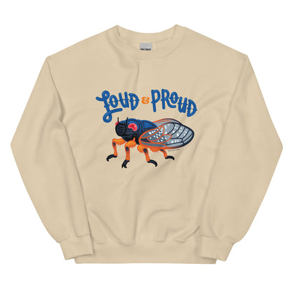 A sand sweatshirt with an illustration of a cicada and the words loud & proud printed on the front of it.
