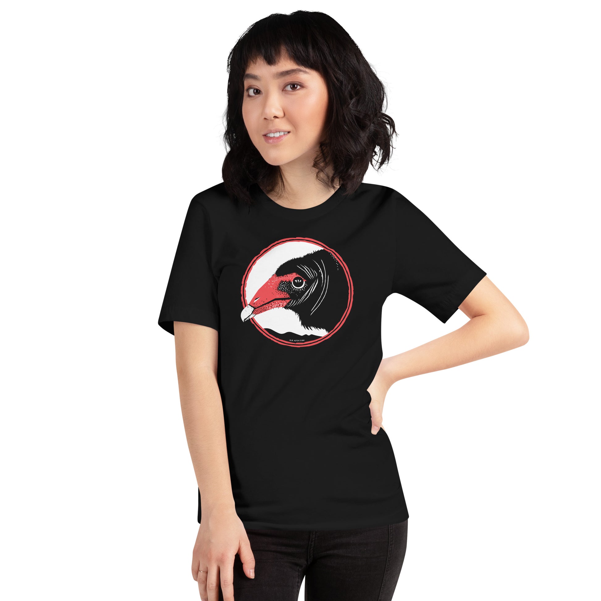 A woman modeling the Blue Aster Studio turkey vulture shirt.