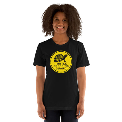 A woman wearing the turtle crossing guard short-sleeved tee.