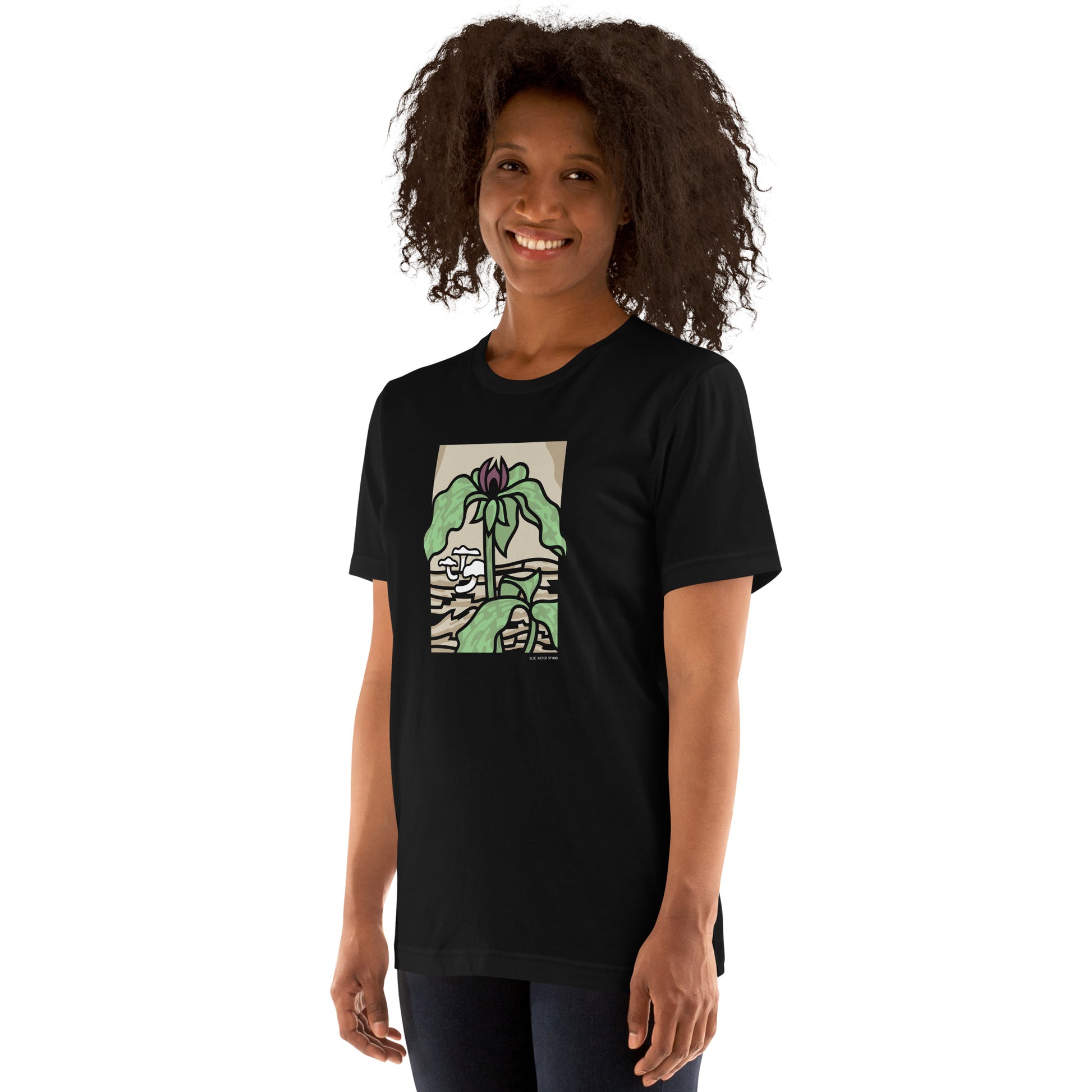 A woman wearing the unisex prairie trillium t-shirt.