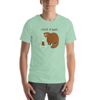 A man modeling the unisex beaver t-shirt in the mint color.