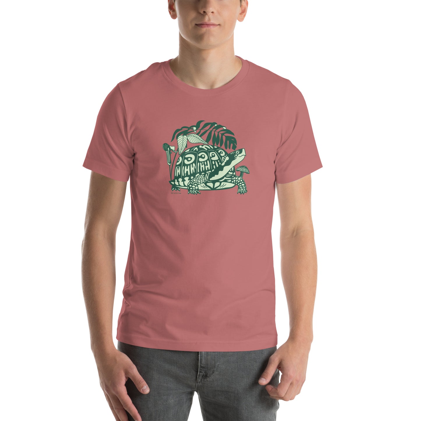 A model wearing the mauve colored box turtle tee.