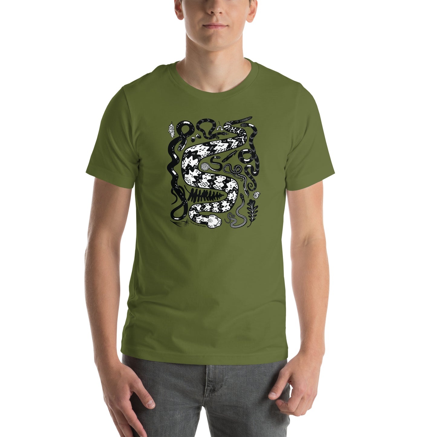 A man modeling the unisex seven snakes t-shirt in olive green.