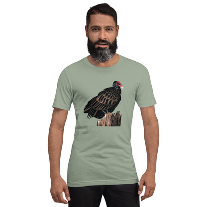 A man modeling the short-sleeved majestic turkey vulture t-shirt in sage green.