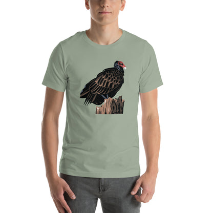 A man wearing the sage green majestic turkey vulture tee.