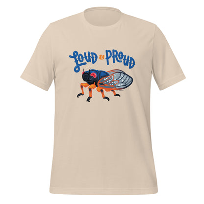 A soft cream short-sleeved t-shirt with an illustration of a cicada and the words Loud & Proud printed on the front.