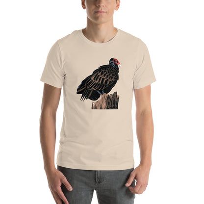 A man modeling the majestic turkey vulture shirt in the cream color.