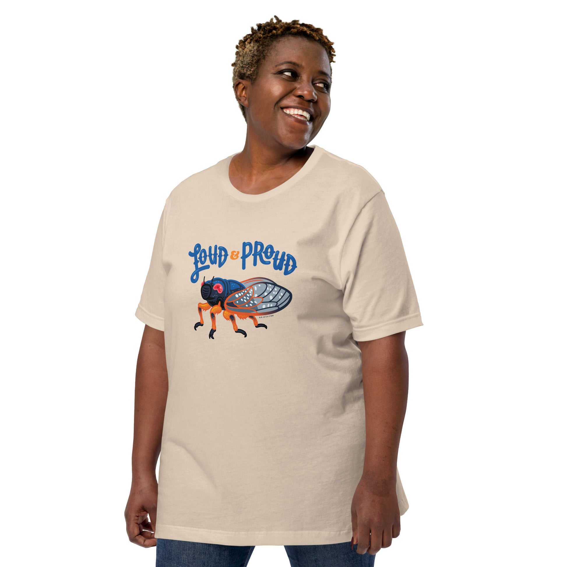A woman modeling the unisex cicada t-shirt in soft cream.