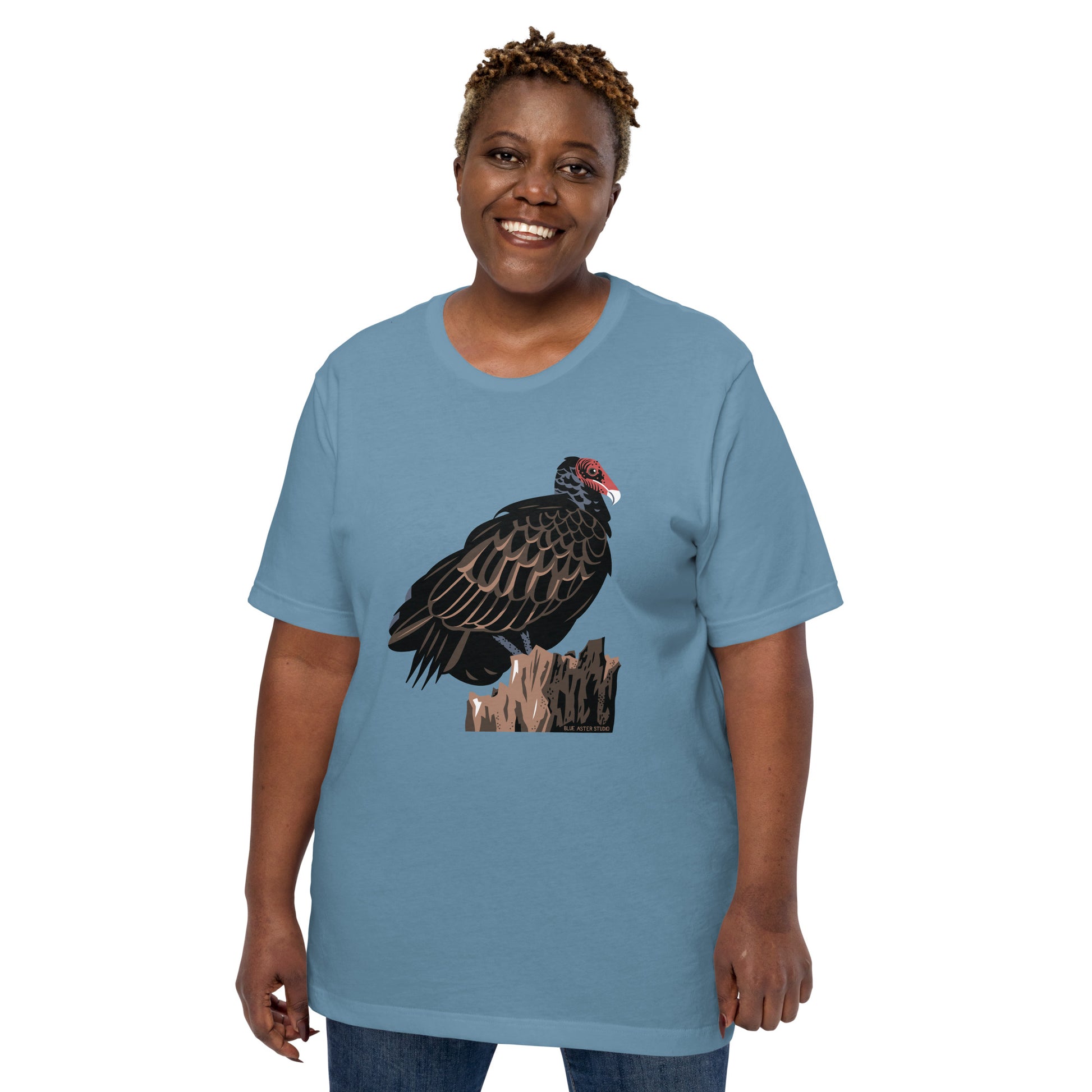 A woman modeling the blue majestic turkey vulture short-sleeved t-shirt.