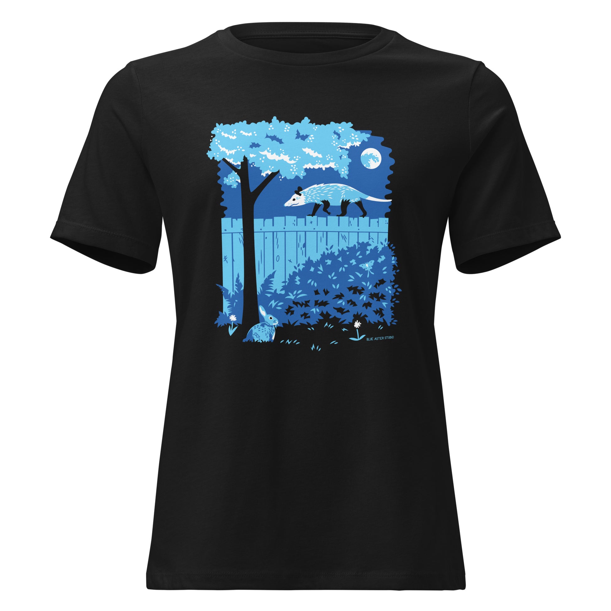 A black short-sleeved ladies cut t-shirt with an image of an opossum walking on a moonlit fence with a rabbit and a luna moth in the yard below.