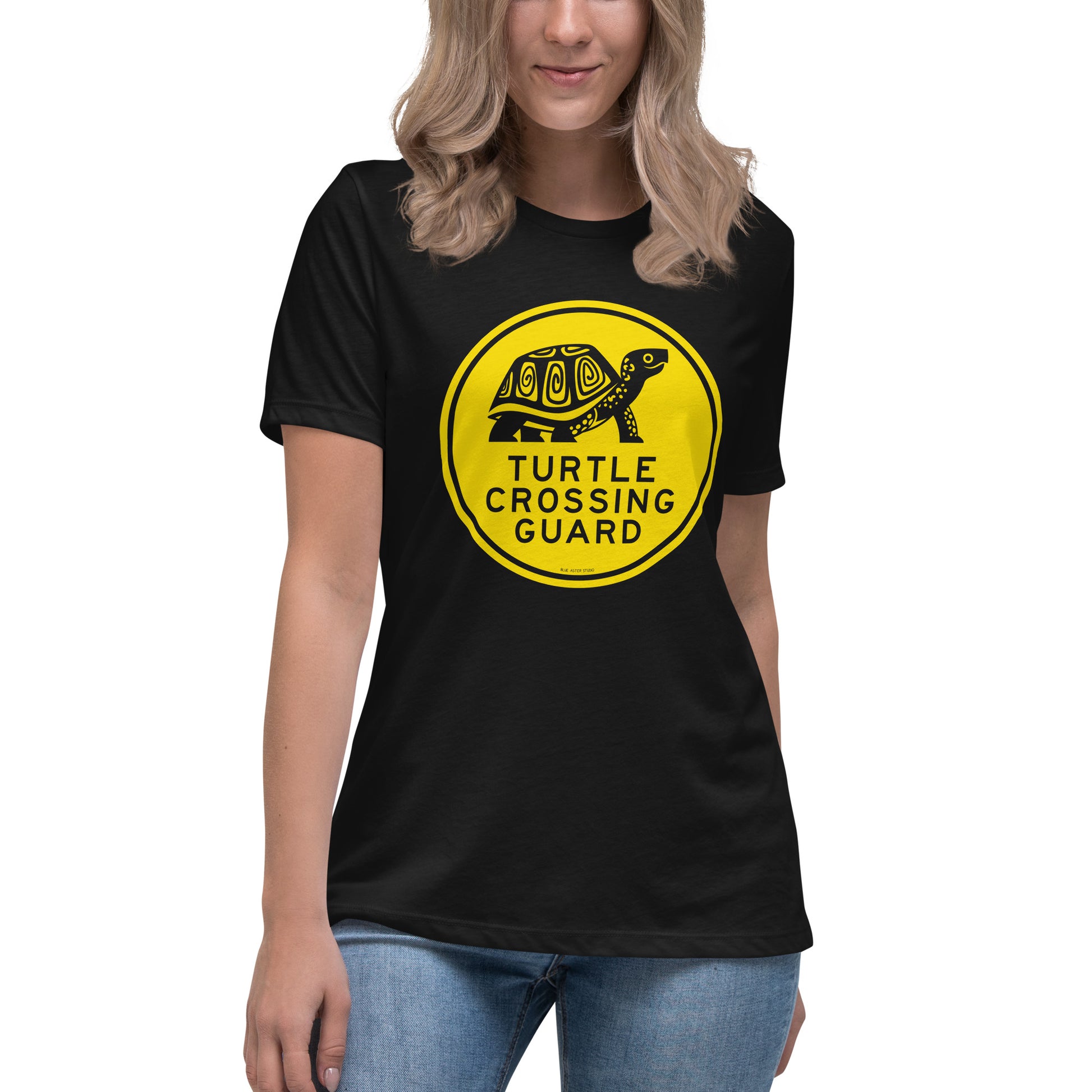 Model wearing a black turtle crossing guard tee.