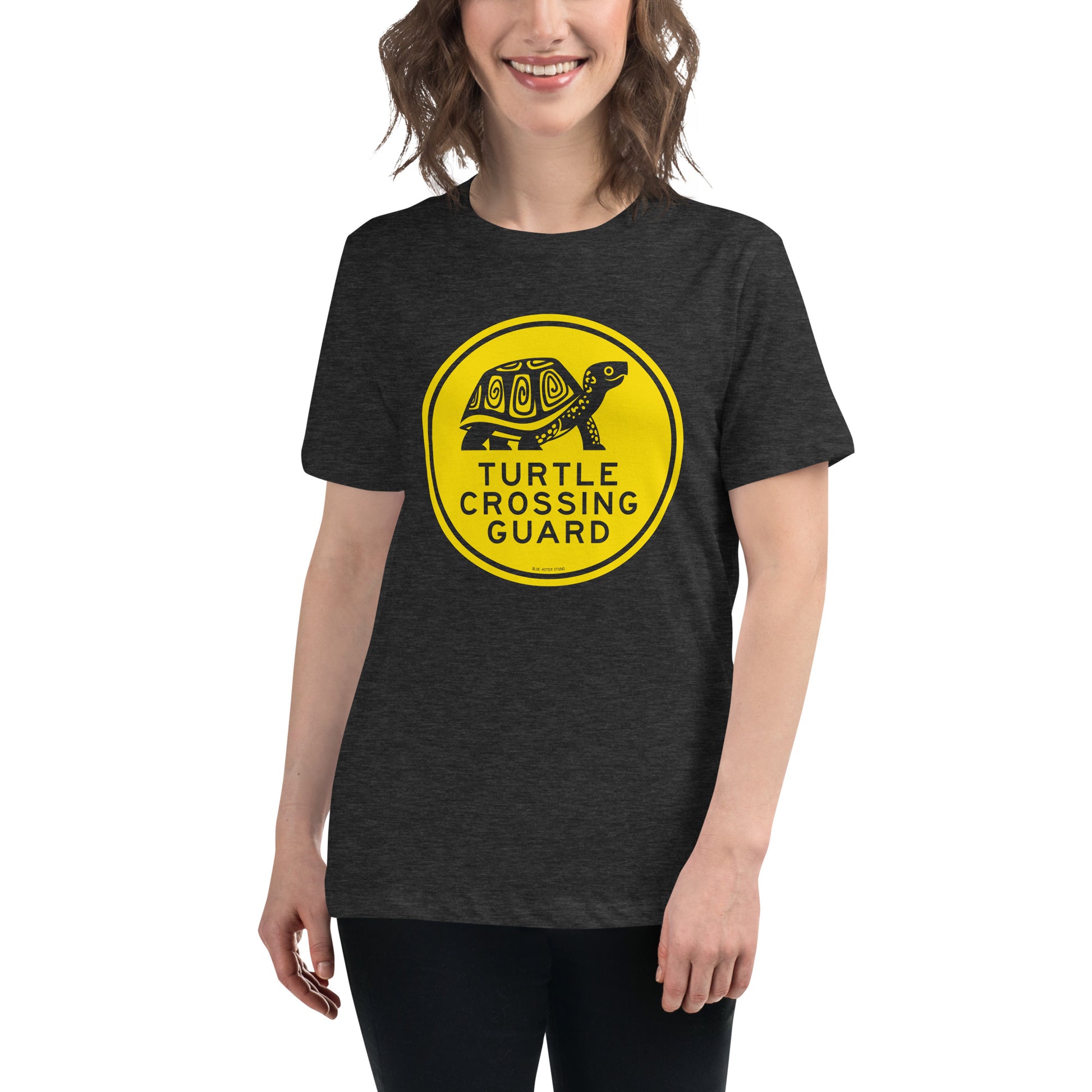 Model wearing heather grey turtle crossing guard t-shirt.