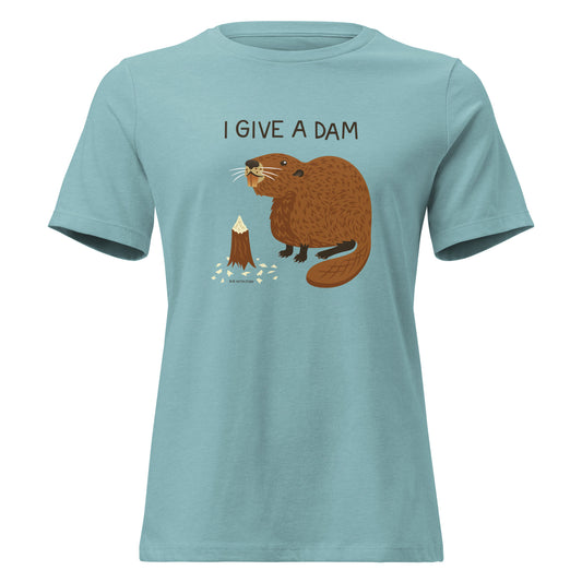 A heather blue women's relaxed fit t-shirt with an illustration of a beaver and the words I Give A Dam printed on the front.