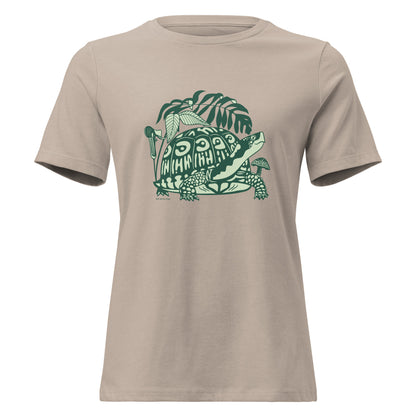 Heather tan colored ladies t-shirt with a design of a box turtle surrounded by North American woodland plants.