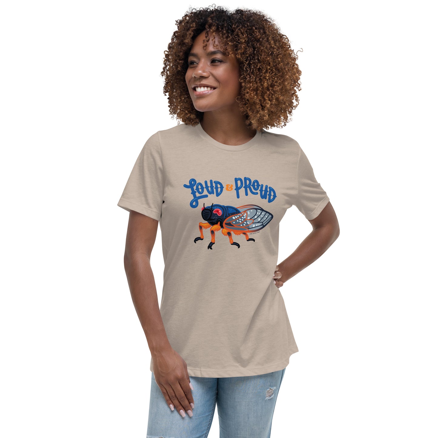 A woman is modeling the heather stone cicada t-shirt.