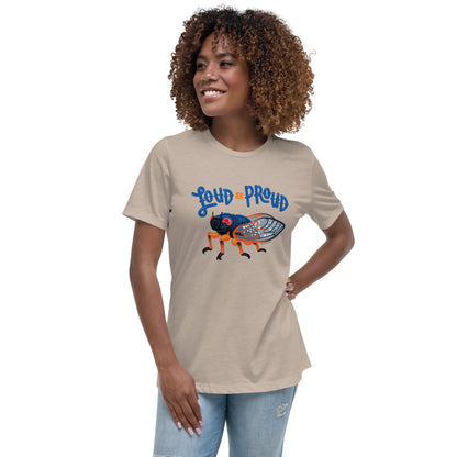 A woman is modeling the heather stone cicada t-shirt.