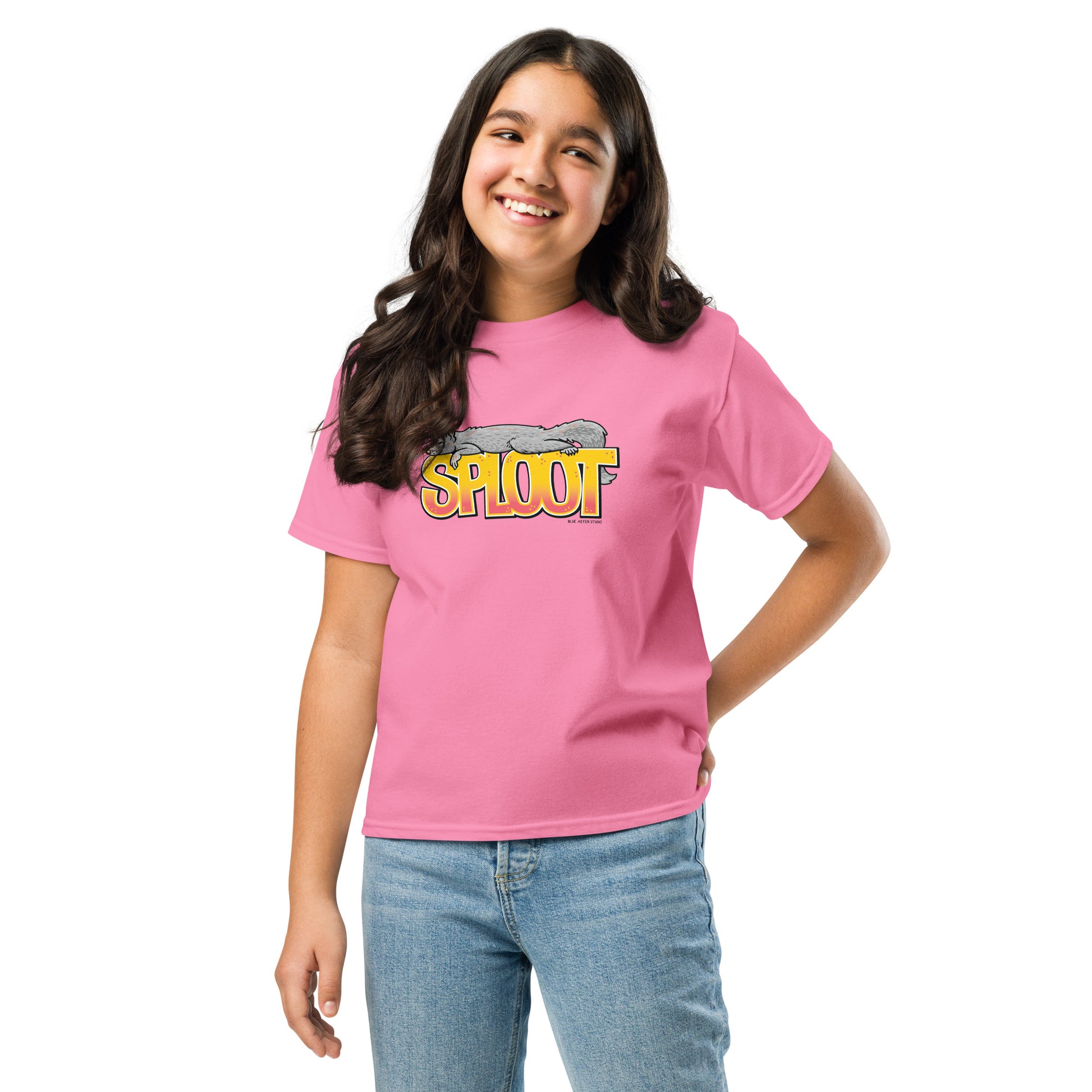A young girl modeling the squirrel sploot youth t-shirt in the pink azalea color option.